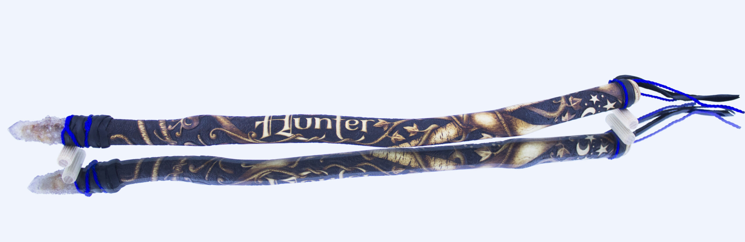 Long wooden wand tipped with a quartz point, burned with intertwined vines, stars and the name Hunter